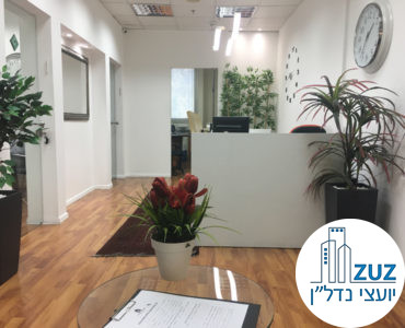 עמדת קבלה במשרד בבית עמגר תל אביב