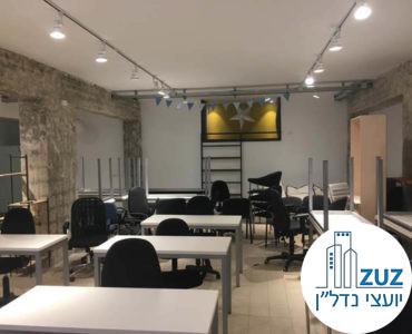 אופן ספייס עם שולחנות במשרד ברחוב ריבל תל אביב