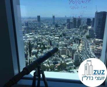חלון עם טלסקופ במשרד במגדל עזיראלי משולש תל אביב