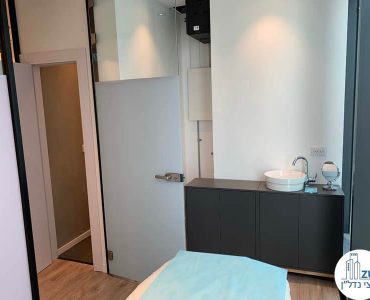 חדר טיפולים במשרד של לקוחה מרוצה מעסקת תיווך במגדלי הארבעה תל אביב