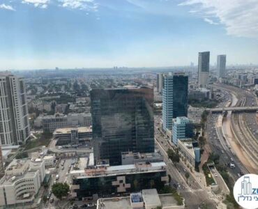 נוף למגדל סוזוקי מחלון של משרד להשכרה במגדלי אלון תל אביב