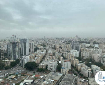 נוף מחלון במשרד של לקוחות מרוצים מעסקת מכירה במגדל רסיטל תל אביב