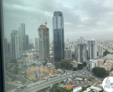 נוף מחלון במשרד של לקוחות מרוצים מעסקת מכירה במגדל רסיטל תל אביב