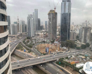 נוף מחלון במשרד של לקוחות מרוצים מעסקת מכירה במגדל רסיטל תל אביב