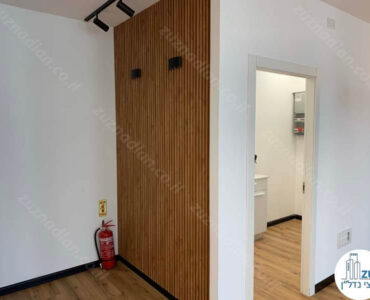 קיר מעוצב משרד להשכרה במגדל אקרו נדל"ן תל אביב