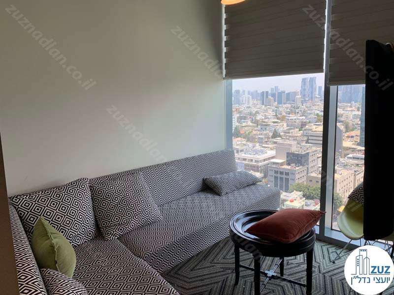פינת ישיבה של משרד להשכרה ברוטשילד 22 תל אביב