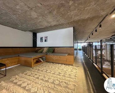 פינת מנוחה של משרד להשכרה להייטק 1400 מר בשכונת מונטיפיורי בתל אביב