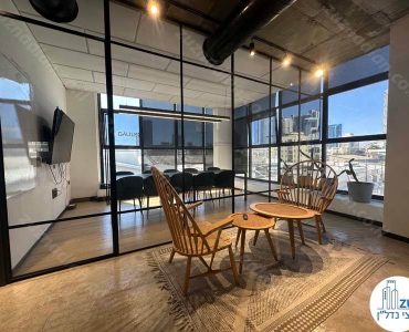 פינת ישיבה של משרד להשכרה להייטק 1400 מר בשכונת מונטיפיורי בתל אביב