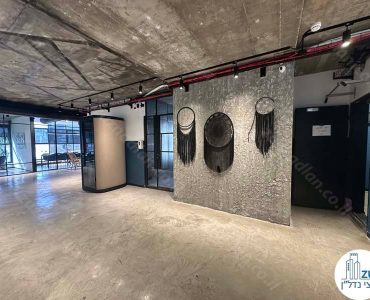 קיר מעוצב של משרד להשכרה להייטק 1400 מר בשכונת מונטיפיורי בתל אביב